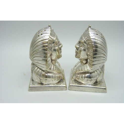 924 - A pair of Mappin & Webb Egyptian Revival silver plated salt and pepper pots