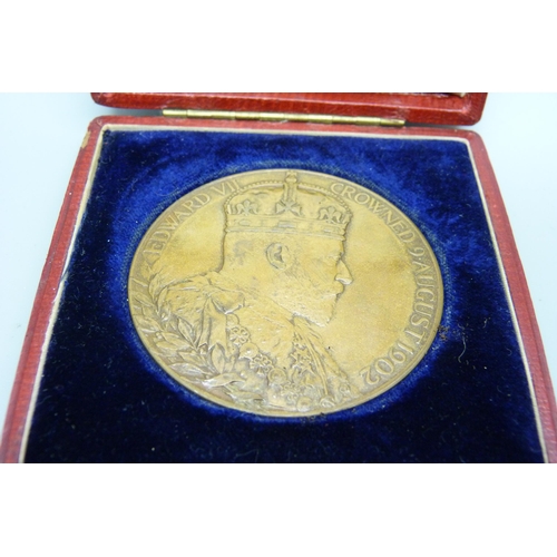 927 - A cased commemorative medal, Queen Consort 1902 and a Queen Victoria bronze Golden Jubilee coin