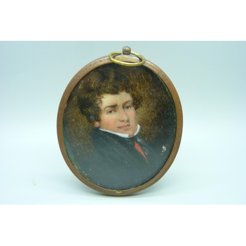 931 - A Georgian oval portrait miniature on card, framed