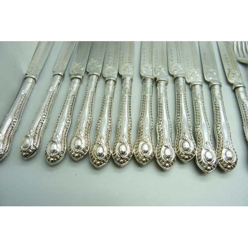 934 - Twenty-four silver handled fruit knives and forks