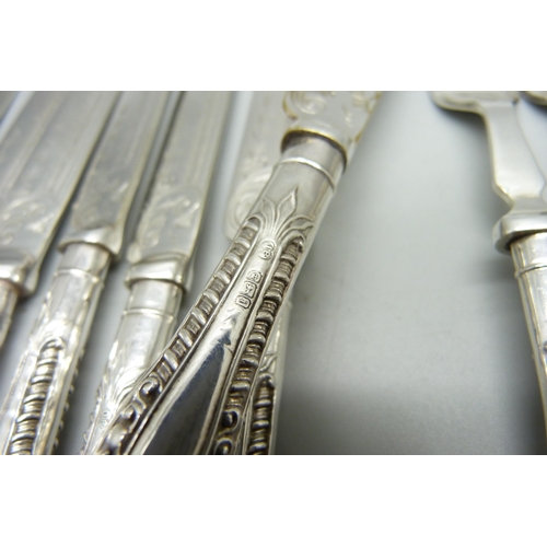 934 - Twenty-four silver handled fruit knives and forks