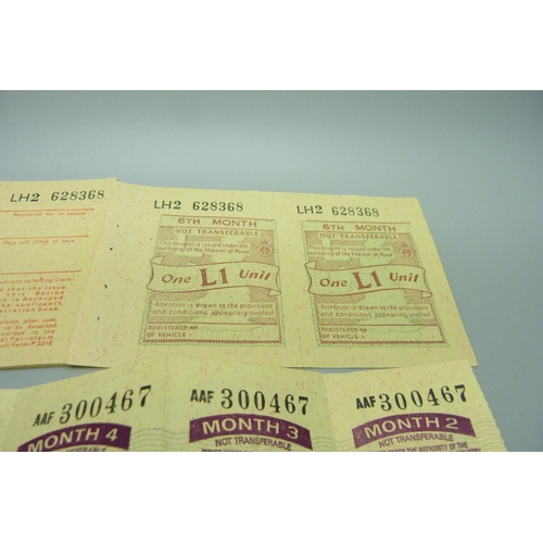 935 - A fuel ration book and tokens