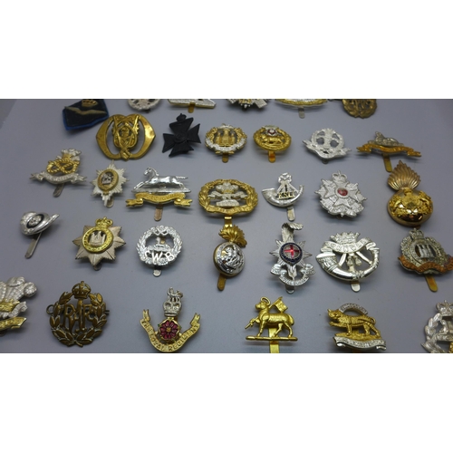 948 - Military cap badges including reproduction