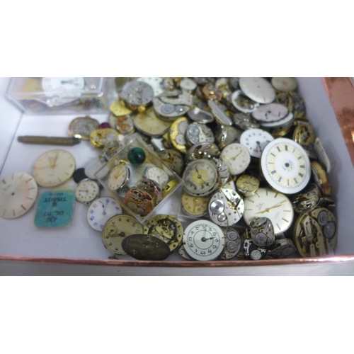 975 - A box of wristwatch movements, Record, Gruen, Waltham, Seiko and trench watch movements