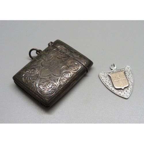 996 - A silver vesta case and a silver fob, both a/f, 36g