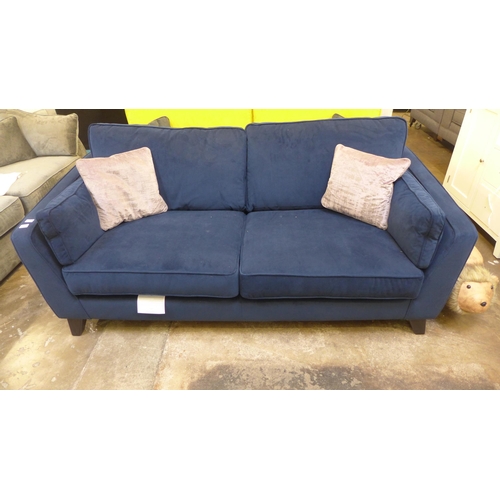 1321 - A Barker and Stonehouse Vincent blue velvet three seater sofa RRP £1439