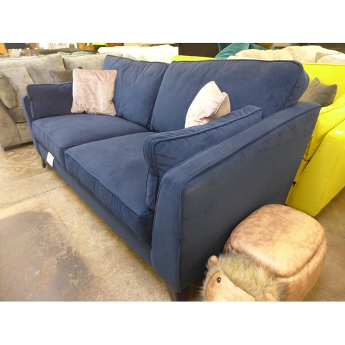 1321 - A Barker and Stonehouse Vincent blue velvet three seater sofa RRP £1439