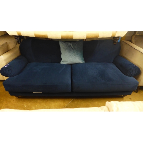 1431 - A midnight blue velvet four seater sofa - marked