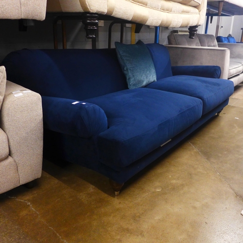 1431 - A midnight blue velvet four seater sofa - marked