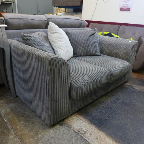 1460 - A grey jumbo corduroy two seater sofa