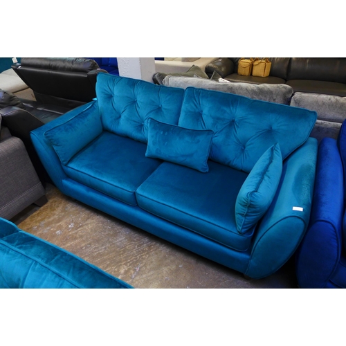 1469 - An Aquamarine velvet three seater sofa