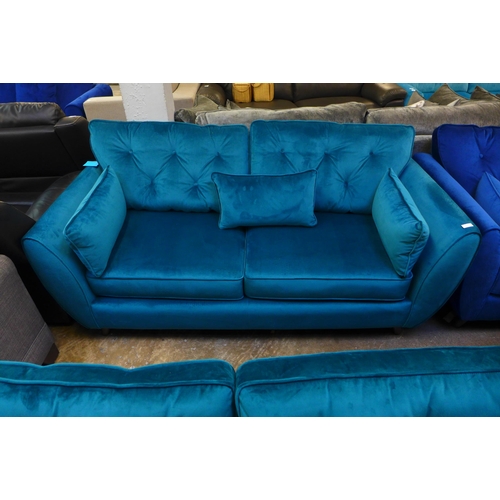 1469 - An Aquamarine velvet three seater sofa