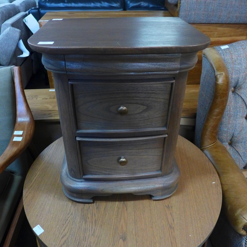 1586 - A Liberty, three drawer, bedside chest in stained oak