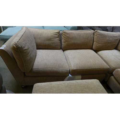 1591 - A sand upholstered corner sofa and footstool