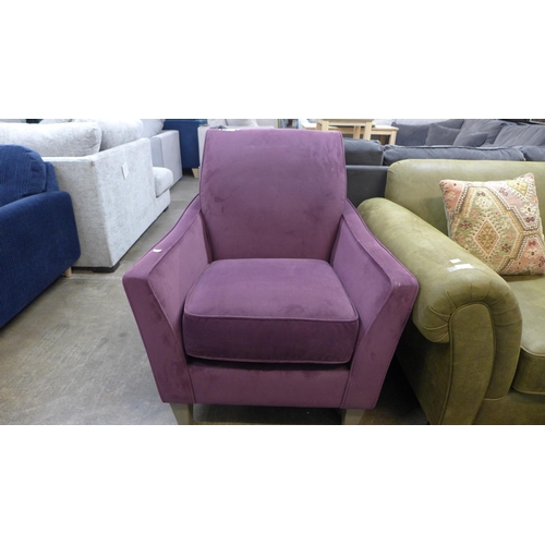 1679 - A dark magenta velvet curved back armchair - small slit