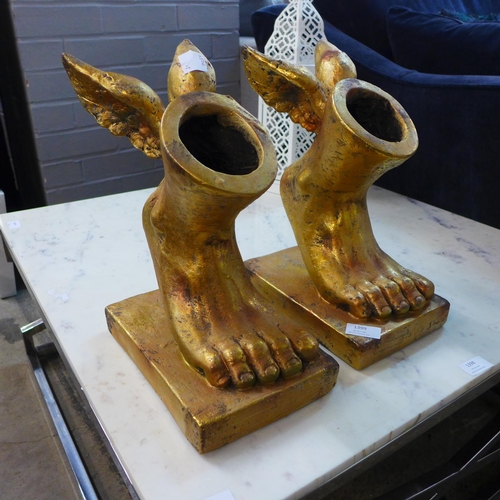 1399 - A pair of gold winged foot planters