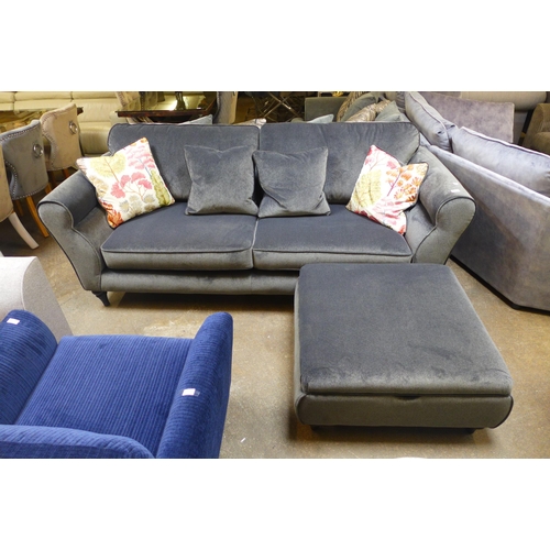 1503 - A metallic charcoal upholstered four seater sofa with patterned scatter cushions