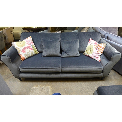 1503 - A metallic charcoal upholstered four seater sofa with patterned scatter cushions