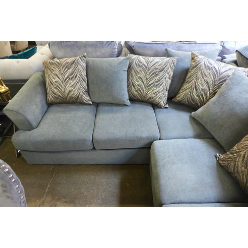 1504 - A stone upholstered corner sofa