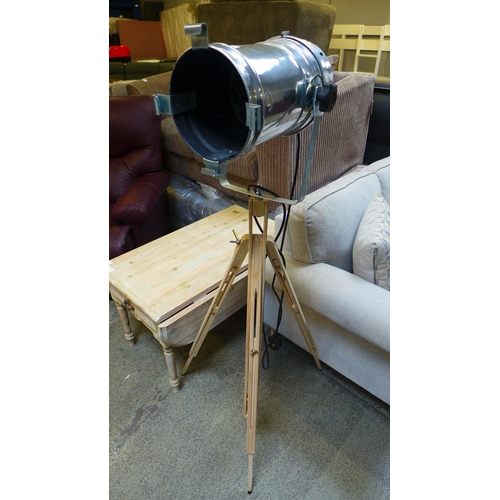 1637 - A floor standing tripod theatre style lamp