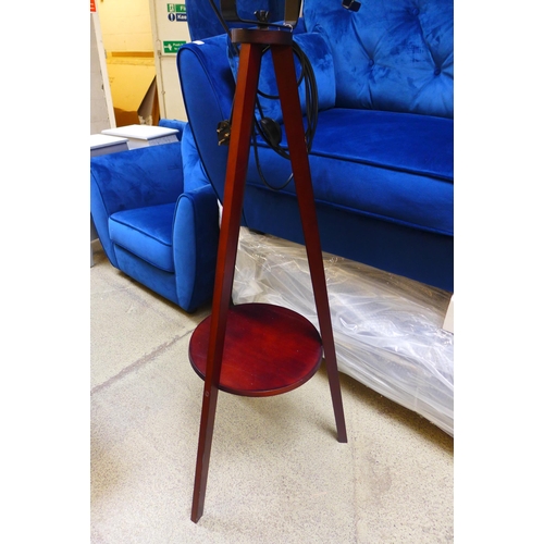 1638 - A floor standing tripod theatre style lamp