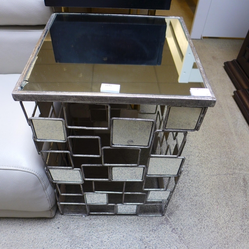 1645 - A metal and mirrored side table, chipped glass on top