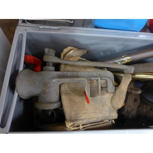 2195 - Box of metal misc. items; grease gun, lamp and meat mincer