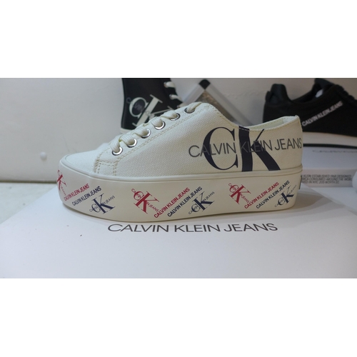 2286 - Four pairs of Calvin Klein boxed: Low-Tops (UK 7, UK 4) and Hi-Tops, UK 4