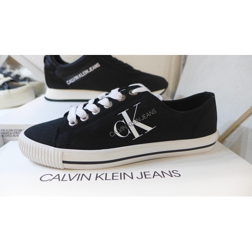 2286 - Four pairs of Calvin Klein boxed: Low-Tops (UK 7, UK 4) and Hi-Tops, UK 4