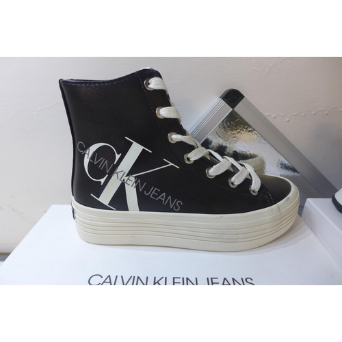 2286 - Four pairs of Calvin Klein boxed: Low-Tops (UK 7, UK 4) and Hi-Tops, UK 4