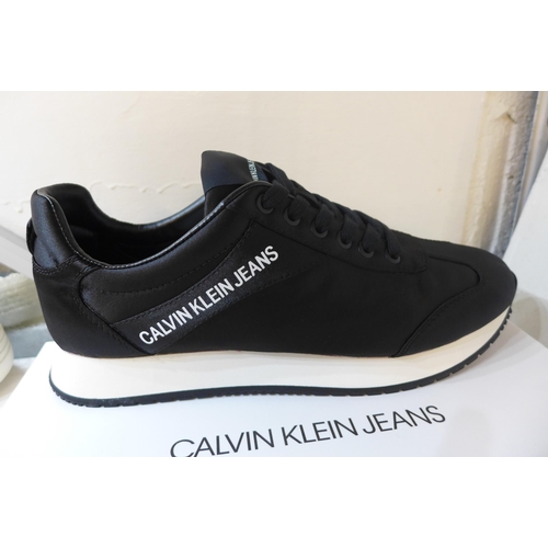 2286 - Four pairs of Calvin Klein boxed: Low-Tops (UK 7, UK 4) and Hi-Tops, UK 4