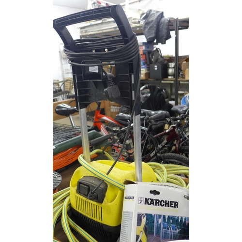 2382 - Karcher 330 lightweight pressure washer and hose pipe