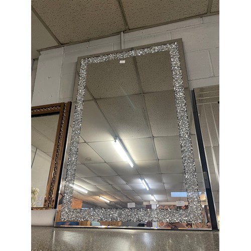 1518 - A Gatsby mirror with bevelled edges and border with crushed glass crystals, H 120 x 80cms 9G80X12059... 