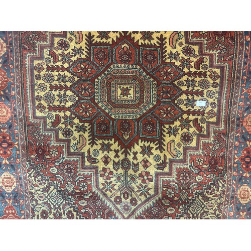 1581 - A fine hand woven Persian Surook rug, full pile with medallion design