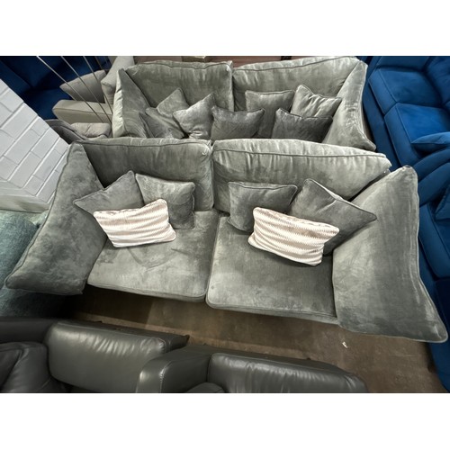 1997 - A Halley magnesium upholstered 3 seater sofa