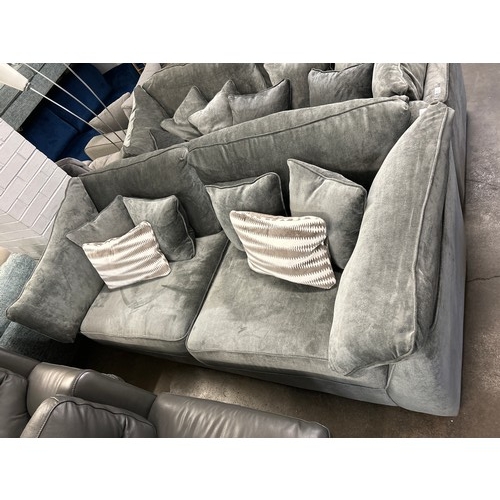 1997 - A Halley magnesium upholstered 3 seater sofa