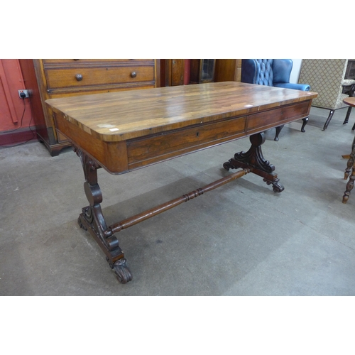 11 - A William IV rosewood two drawer library table