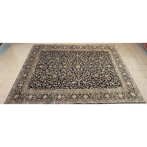 92 - A large Persian blue ground Isfahan rug, 350 x 284cms