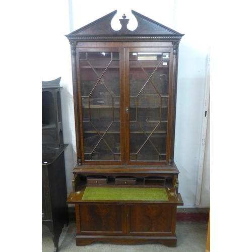 223 - A George IV style mahogany secretaire bookcase