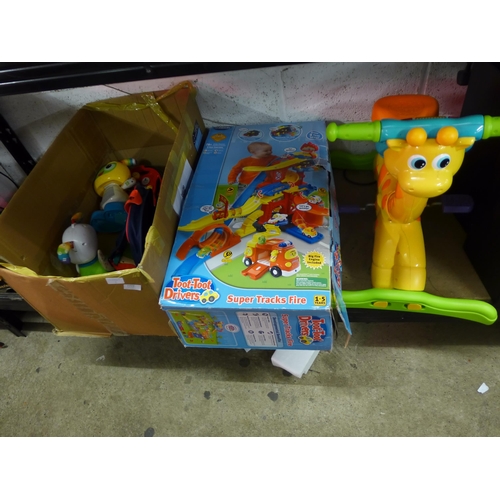 2107 - Box of toys and ride on giraffe