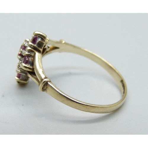 1023 - A 9ct gold, ruby and white stone dress ring, 1.7g, M