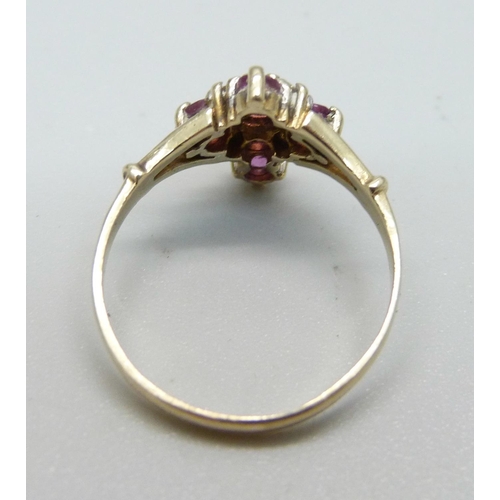 1023 - A 9ct gold, ruby and white stone dress ring, 1.7g, M