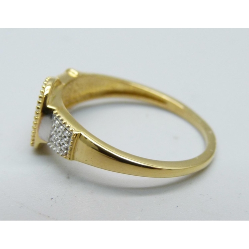 1026 - A silver gilt and diamond set buckle ring, R