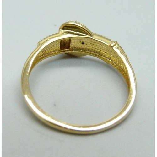 1026 - A silver gilt and diamond set buckle ring, R