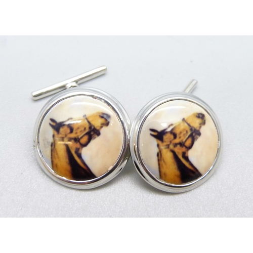 1041 - A pair of silver and enamel horse cufflinks