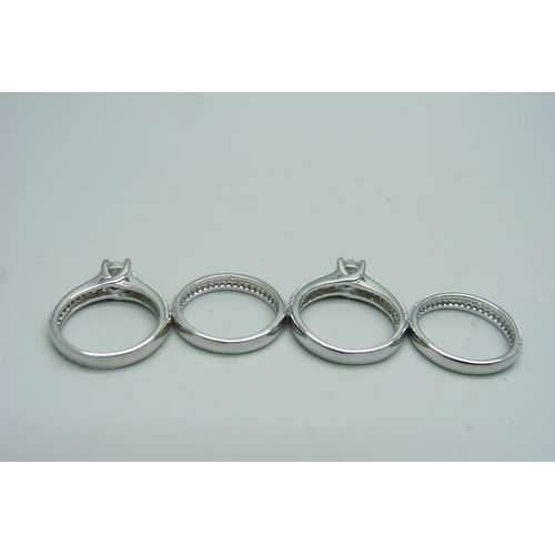 1077 - Four silver dress rings, marked S925, unused, 2x K, 2x L