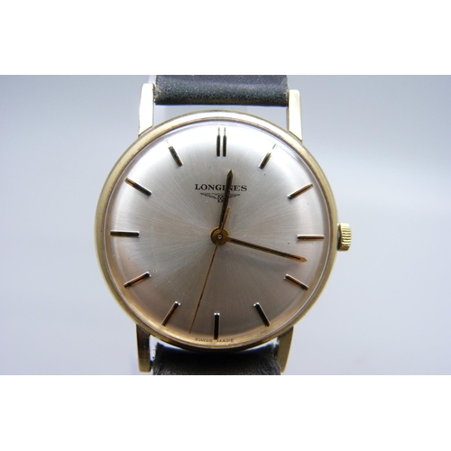 1084 - A 9ct gold Longines wristwatch, 32mm case