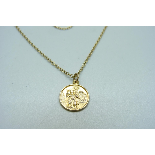 1101 - A 9ct gold St. Christopher pendant and chain, 3.2g