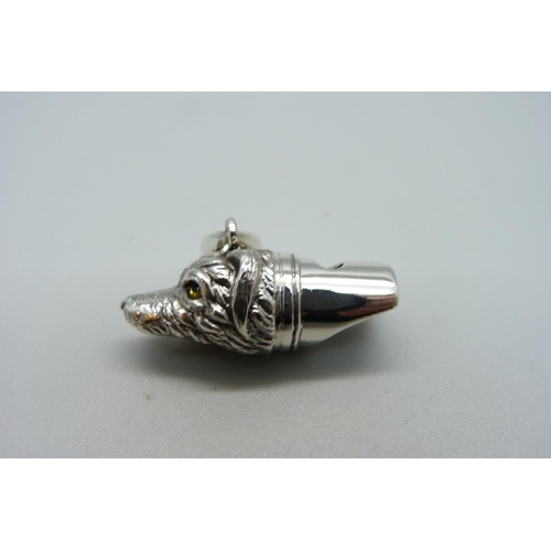 1102 - A silver dog whistle pendant