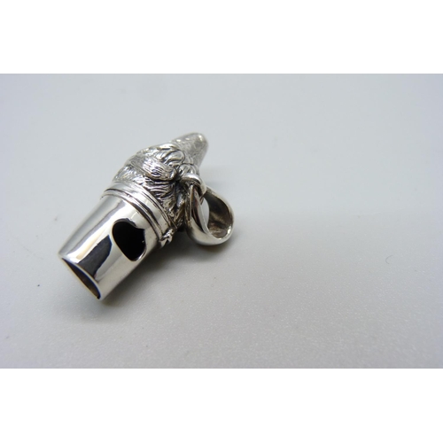 1102 - A silver dog whistle pendant